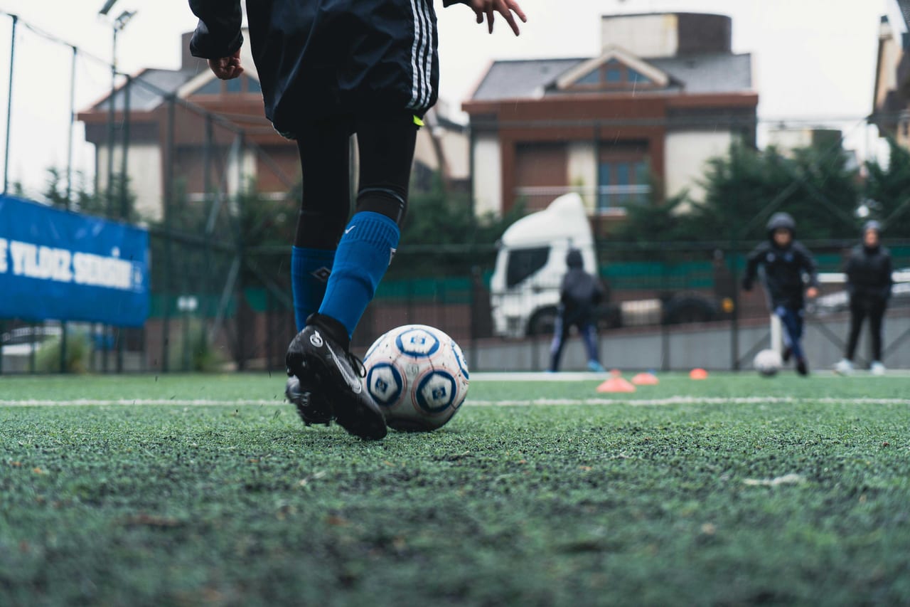 Manchester Victoria FC player training at Harpurhey